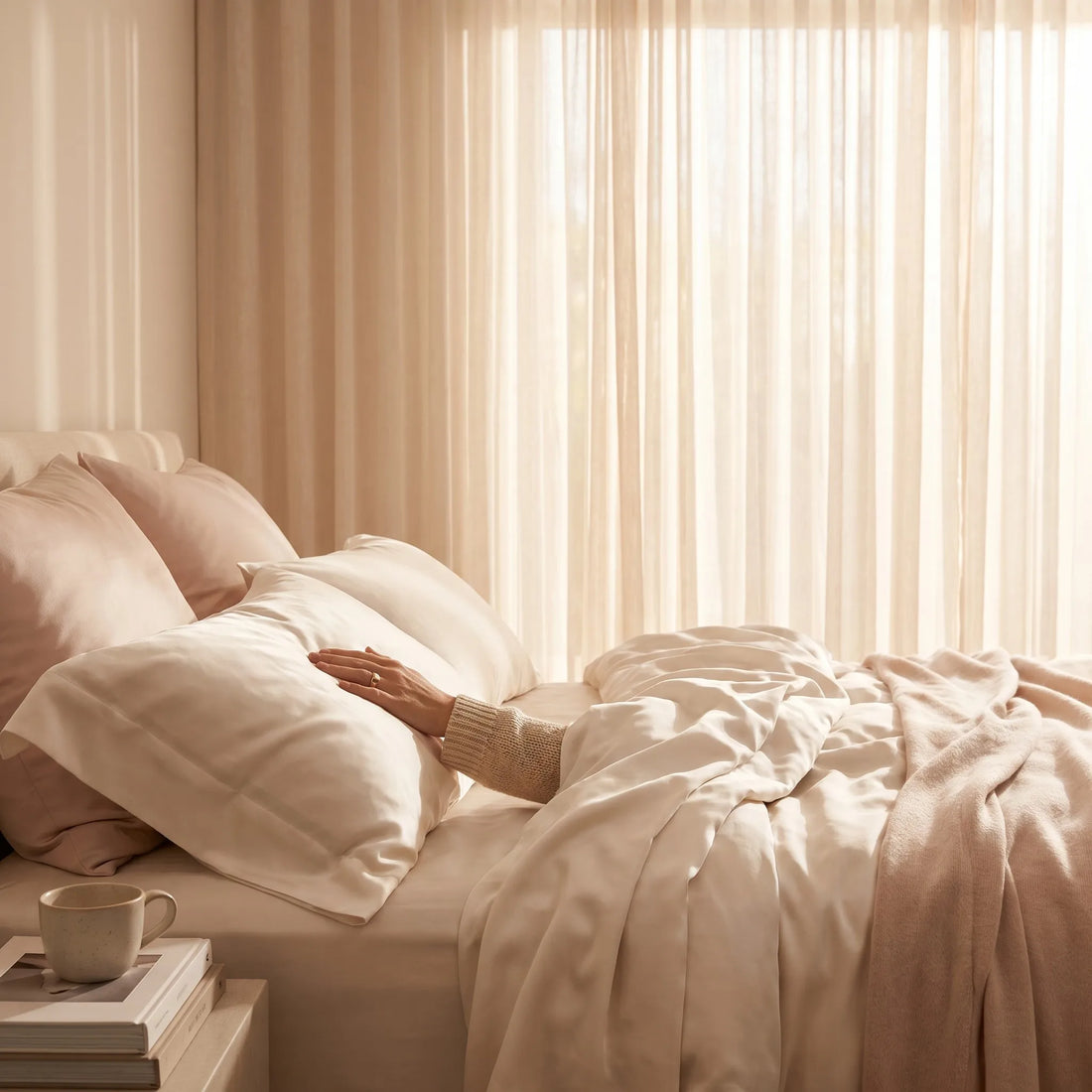 22 momme mulberry silk bedding in a softly lit bedroom